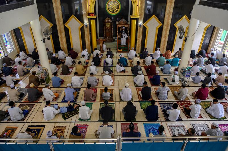 Indonesian Muslim men take part in prayers at a mosque in Palu, Central Sulawesi Province, Indonesia. Reuters