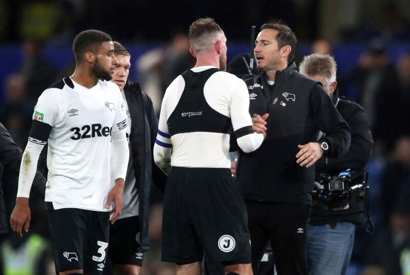 Frank Lampard shakes hands with Richard Keogh after the game. AP Photo