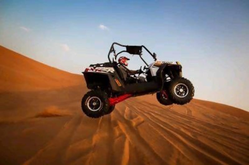 The two-seat Razors offer extremely sharp handling and quck acceleration for jumping over dunes. Courtesy Polaris