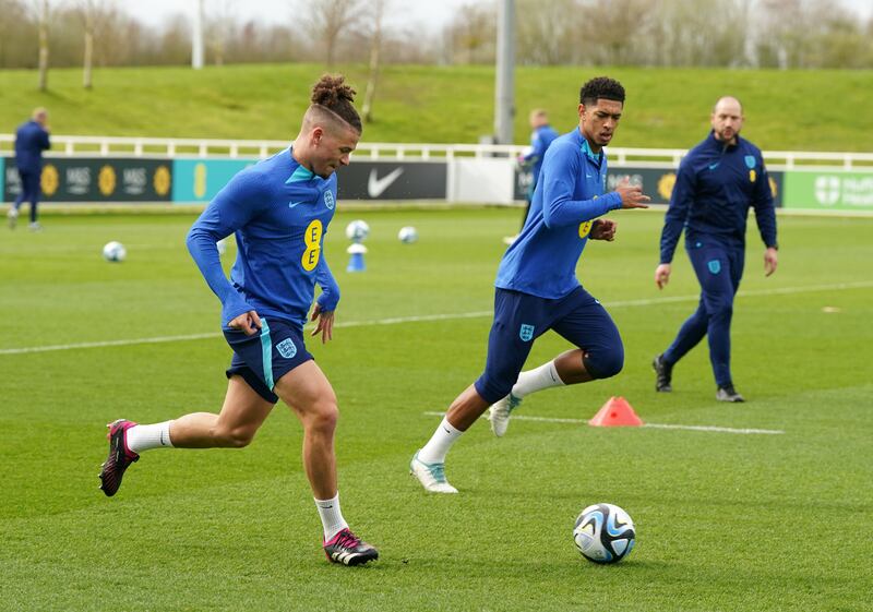 England's Kalvin Phillips and Jude Bellingham during training. PA