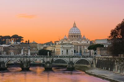 Sunset lights of the basilica St Peter in Rome, Italy
