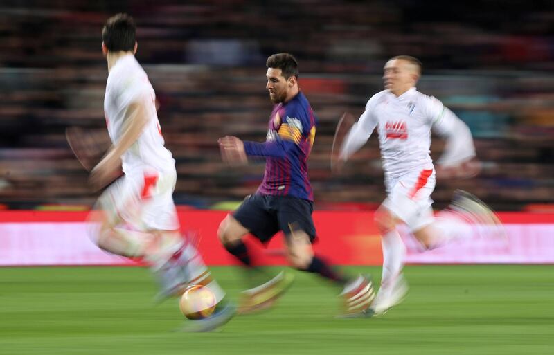 Barcelona's Lionel Messi runs at the Eibar defence. Reuters