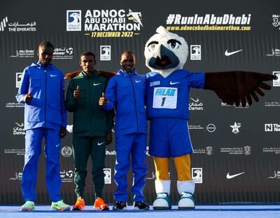 Left to right: Daniel Kibet, Adeladhew Mamo and Dickson Chumba ahead of the Abu Dhabi Marathon. Victor Besa / The National