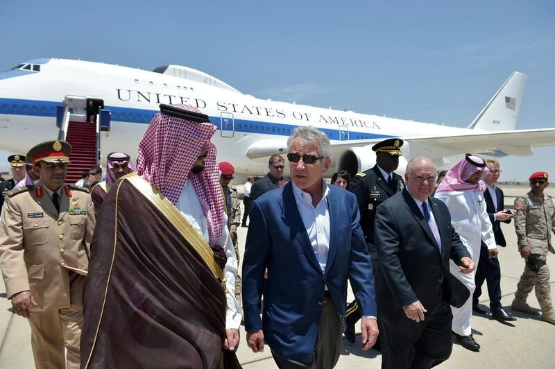 The US defence secretary Chuck Hagel is welcomed by the Saudi deputy defence minister Salman bin Sultan at King Abdulaziz International Airport in Jeddah on May 13, 2014. Mandel Ngan / Getty Images