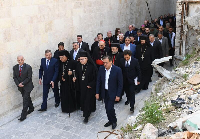 Patriarch Youssef Al Absi leads the faithful.