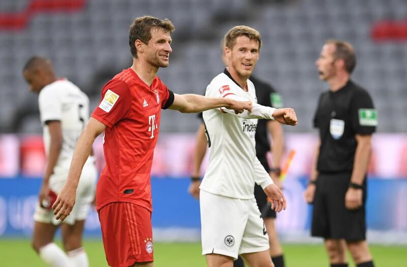 Thomas Muller with Eintracht Frankfurt's Erik Durm after the match. Reuters