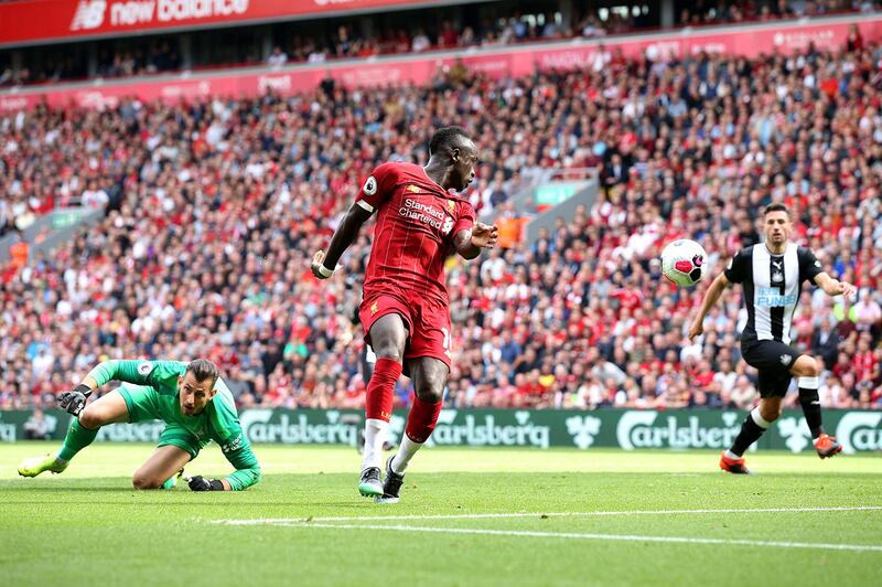 LIVERPOOL, ENGLAND - SEPTEMBER 14: Sadio Mane of Liverpool scores his team's second goal during the Premier League match between Liverpool FC and Newcastle United at Anfield on September 14, 2019 in Liverpool, United Kingdom. (Photo by Jan Kruger/Getty Images)