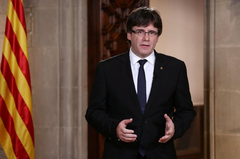 Catalan Regional President Carles Puigdemont gestures as he makes an statement at Generalitat Palace in Barcelona, Spain, October 4, 2017. Catalan Goverment/Jordi Bedmar Handout via REUTERS ATTENTION EDITORS - THIS IMAGE HAS BEEN SUPPLIED BY A THIRD PARTY. NO RESALES. NO ARCHIVE.