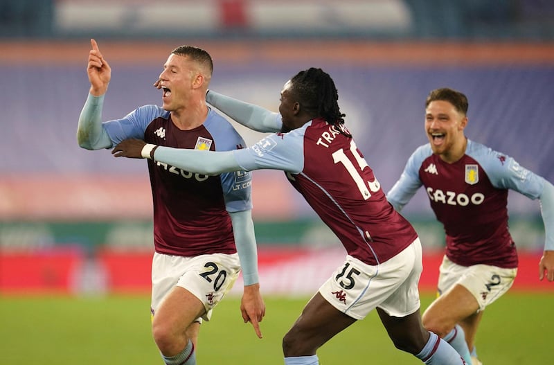 Aston Villa's Ross Barkley, left, celebrates after scoring during the English Premier League soccer match between Leicester City and Aston Villa at the King Power Stadium in Leicester, England, Sunday, Oct. 18, 2020. (Jon Super, Pool via AP)