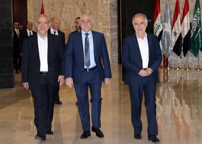 epa07338358 Lebanese Hezbollah Ministers (L-R), Minister of State for Parliament Mahmoud Qmati, Minister of Health Jamil Jabaq, Minister of Youth and Sports Mohammed Fneish arrive to attend the first meeting of the new government at the presidential Palace in Baabda, east of Beirut, Lebanon, 02 February 2019. Lebanon formed a new government ending nine months of wrangling and deadlock, the government headed by Saad Hariri who has Western and Arabic backing. Hezbollah emerged stronger since the parliamentary election May 2019, held positions in three ministries including the Ministry of Health.  EPA/NABIL MOUNZER