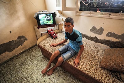 Montaser Bakr, the only survivor of the Bakr children involved in the beach attack, in his Gaza City home. Majed Mahmoud for The National