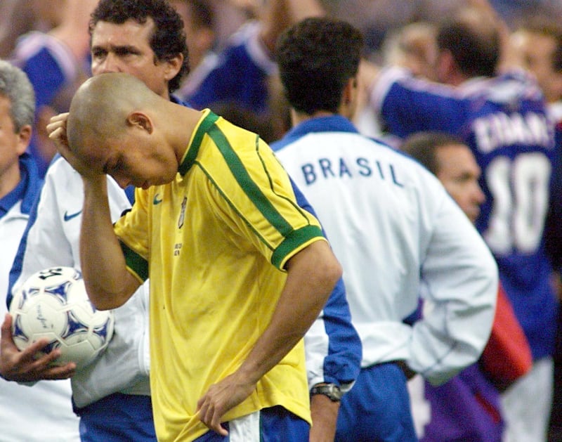 Brazilian forward Ronaldo looks dejected 12 July at the Stade de France in Saint-Denis, near Paris, after the 1998 Soccer World Cup final matchvs Brazil. France won the title for the first time beating Brazil 3-0. (ELECTRONIC IMAGE) AFP PHOTO ANTONIO SCORZA / AFP PHOTO / ANTONIO SCORZA