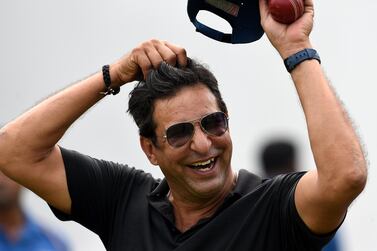 Former Pakistan cricketer Wasim Akram looks on during a practice session at the Sinhalese Sports Club (SSC) grounds in the Sri LAnkan capital Colombo on December 1, 2016. - Former Pakistan cricketer Wasim Akram has begun his coaching tenure with the Sri Lankan cricket team. (Photo by Ishara S. KODIKARA / AFP)
