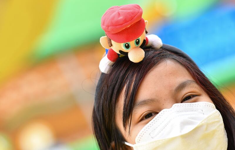 A guest wears a Nintendo headband