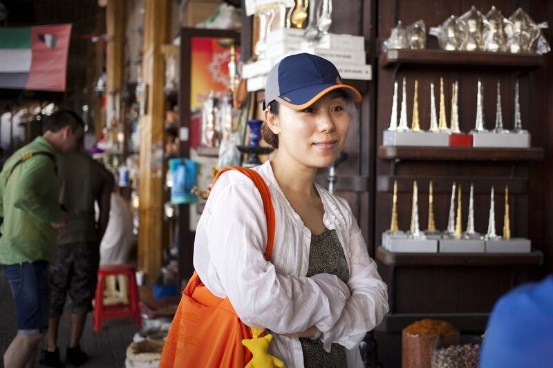A Chinese tourist in Dubai. Razan Alzayani / The National