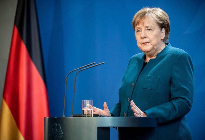 German Chancellor Angela Merkel makes a press statement on the spread of the new coronavirus COVID-19 at the Chancellery, in Berlin on March 22, 2020. German Chancellor Angela Merkel is going in to quarantine after meeting virus-infected doctor according to her spokesman on March 22, 2020. / AFP / POOL / Michael Kappeler
