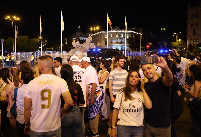 Real Madrid fans celebrate in Cibeles. Reuters