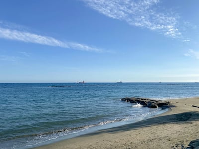 Limassol's beaches have pristine waters and grey sandy shorelines. Photo: Unsplash