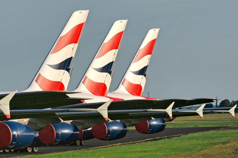 British Airways Airbus A380 aircrafts are parked at the Chateauroux-Deols "Marcel Dassault" Airport (CHR) on May 22, 2020  in Deols, central France. Many planes from several airlines are parked at Chateauroux-Deols airport until the end of the crisis caused by Covid-19, the new coronavirus. / AFP / GUILLAUME SOUVANT
