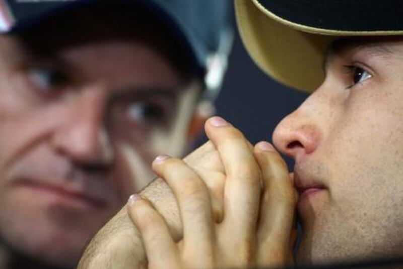 SAO PAULO, BRAZIL - NOVEMBER 24:  Bruno Senna (R) of Renault and Brazil talks with Rubens Barrichello (L) of Williams during the drivers press conference during previews to the Brazilian Formula One Grand Prix at the Autodromo Jose Carlos Pace on November 24, 2011 in Sao Paulo, Brazil.  (Photo by Clive Mason/Getty Images)