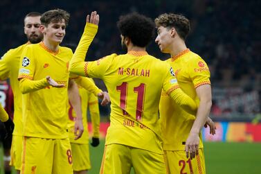 Liverpool's Mohamed Salah, center, celebrates with teammates after scoring his side's first goal during the Champions League, Group B soccer match between AC Milan and Liverpool at the San Siro stadium in Milan, Italy, Tuesday, Dec.  7, 2021.  (AP Photo / Luca Bruno)