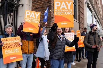 Junior doctors picket outside St Mary's Hospital in London in March. AP
