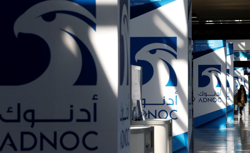 Adnoc logos at a previous Gastech event in Chiba, Japan. Dubai will host the global event this week. Reuters