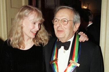 Kennedy Center honouree Andre Previn is greeted by actress and former wife Mia Farrow in 1998. Reuters