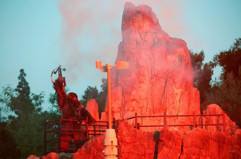 A person dressed as the character Chewbacca performs at Star Wars: Galaxy's Edge. Reuters