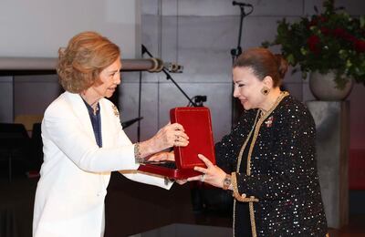 Abu Dhabi Music and Arts Foundation founder Huda Alkhamis Kanoo receives the Medal of Honour from Medal of Honour Queen Sofia of Spain