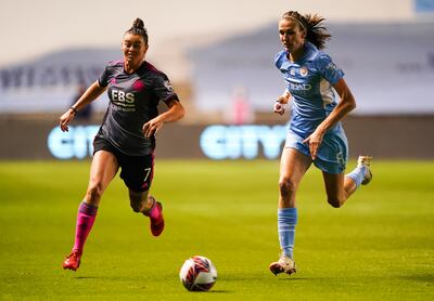 Manchester City's Jill Scott, right, and Leicester City's Natasha Flint battle for the ball during the Women's FA Cup quarter-final at Academy Stadium, Manchester on September 29, 2021. PA