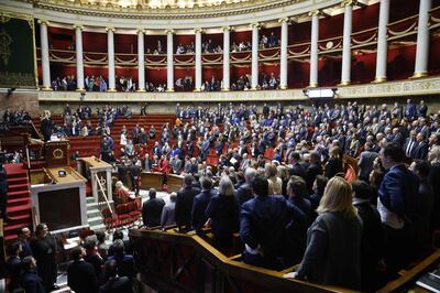 Left-wing MPs sang the French national anthem after the government cancelled a vote. AFP 