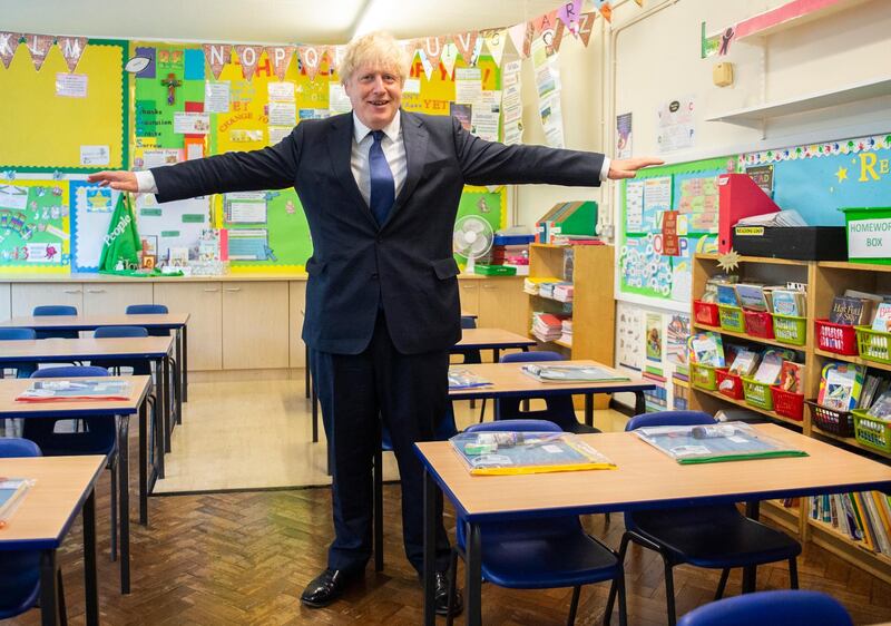 LONDON, ENGLAND - AUGUST 10: British prime minister Boris Johnson poses during a visit to St Josephs Catholic School in Upminster to see how new Covid-19 preparedness plans had been put in place on August 10, 2020 in London, England. The prime minister met with head teacher, Bernadette Matthews, who showed him the new steps which had been implemented to ensure children can return to school safely. (Photo by Lucy Young - WPA Pool / Getty Images)