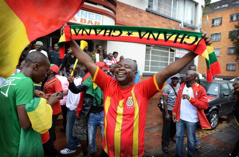 NOT FOR RESALE
JOHANNESBURG - 20130120 - A Ghana supporter waves his scarve during halftime (1-0).  Yeoville is packed with Congolese and Ghanaians during the Afcon match Congo-Ghana .
Photo: Bram Lammers 
NOT FOR RESALE.
COPYRIGHT BRAM LAMMERS PHOTOGRAPHY
