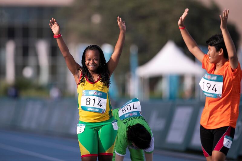 DUBAI, UNITED ARAB EMIRATES - March 16 2019.
Khadija Sy, Senegal, at the Special Olympics World Games athletics 200m run in Dubai Police Academy Stadium.

 (Photo by Reem Mohammed/The National)

Reporter: 
Section:  NA