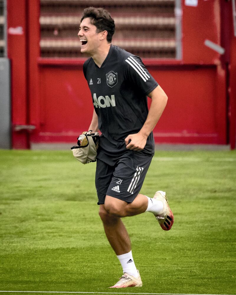 COLOGNE, GERMANY - AUGUST 15:  Daniel James of Manchester United  laughs during a training session at RheinEnergieStadion on August 15, 2020 in Cologne, Germany. (Photo by Ash Donelon/Manchester United via Getty Images)