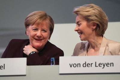 Angela Merkel, Germany's chancellor, left, reacts with Ursula von der Leyen, incoming president of the European Commission and Christian Democratic Union (CDU) lawmaker, during the CDU convention in Leipzig, Germany, on Friday, Nov. 22, 2019. Merkel's CDU has a packed agenda for its two-day party convention, but the question looming over everything -- who will bid to become Germany’s next chancellor -- may take a back seat. Photographer: Krisztian Bocsi/Bloomberg