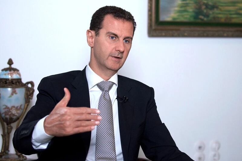 Syrian president Bashar Al Assad speaking during an interview in Damascus. SANA / AFP
