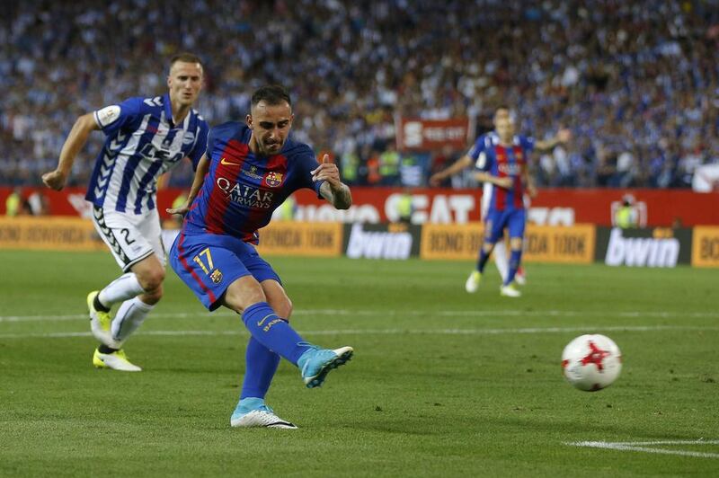 Barcelona’s Paco Alcacer kicks the ball to score his team’s third goal during the Copa del Rey final. Daniel Ochoa de Olza / AP Photo
