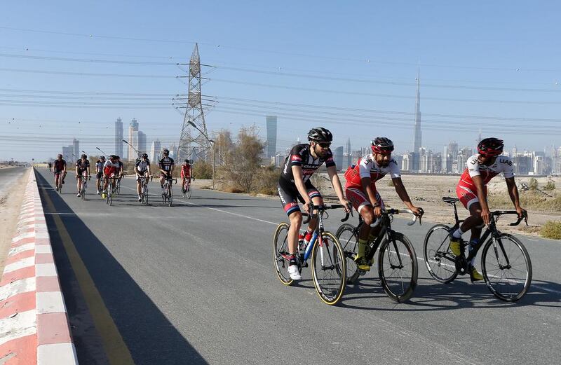 Riders practise for the Dubai Tour at the cycle track in Nad Al Sheba in Dubai. Pawan Singh / The National