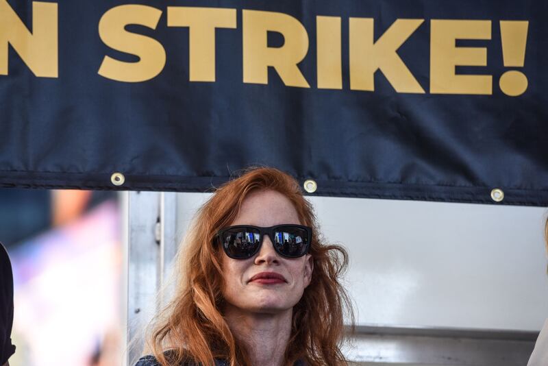 Jessica Chastain joins a rally in Times Square, New York. Bloomberg 