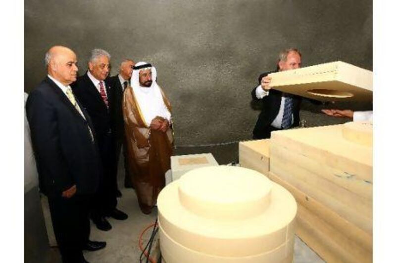 Above, Dr Sheikh Sultan bin Mohammed, the Ruler of Sharjah, launches the emirate's earthquake monitoring centre last month. Satish Kumar / The National Below, the earthquake that shattered Bam, Iran in 2003 was only 500km from the Emirates. Anna Kenare / AFP
