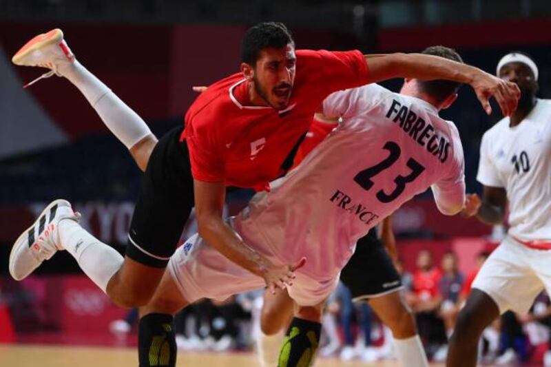 Egypt's right-back Yahia Omar shoots during the men's semifinal.