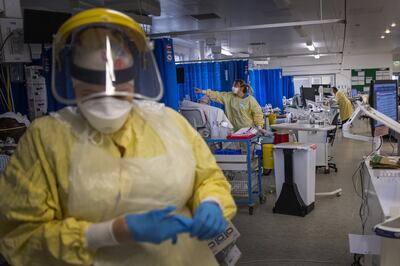 A nurse in PPE at St George's Hospital in Tooting, south-west London. PA Wire