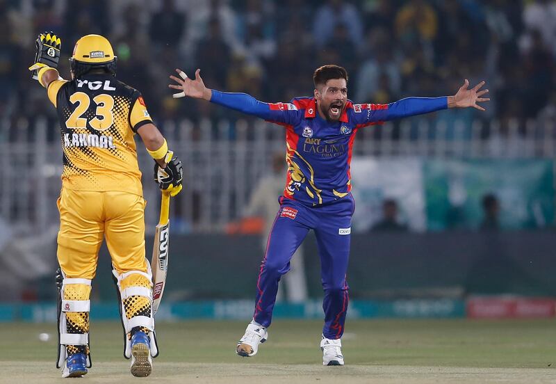 Mohammad Amir, right, has helped Karachi Kings make it to the knockout stage of the Pakistan Super League 2020. AP