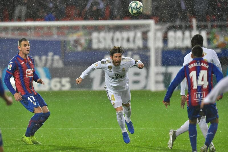 Real Madrid defender Sergio Ramos heads the ball against Eibar. AP Photo