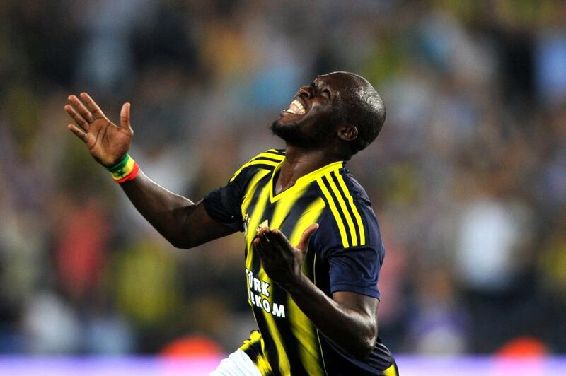 Fenerbahce's Moussa Sow celebrates after scoring a goal during a Uefa Champions League third qualifying round second leg match between against Red Bull Salzburg at Sukru Saracoglu Stadium in Istanbul on August 6, 2013. Ozan Kose / AFP