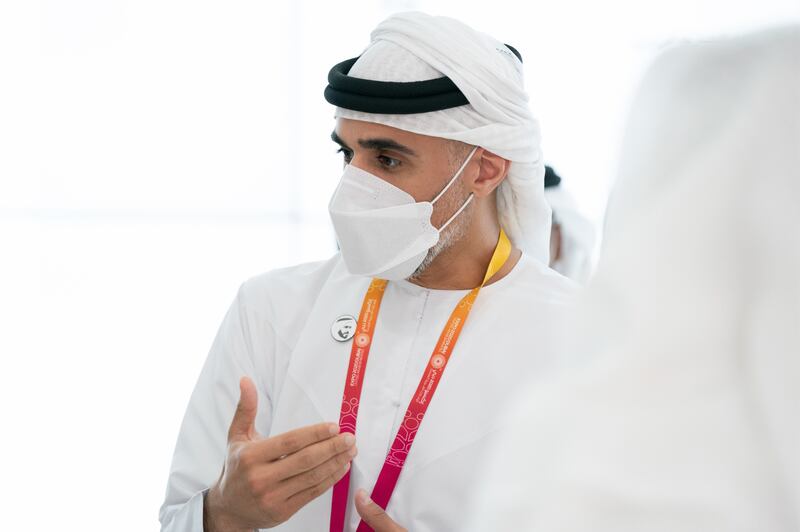 Sheikh Khaled tours the Youth pavilion at the world's fair.