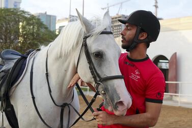 UAE medal winner Mohammed Al Tajer during his training at the Al Ahli Horse Riding Club in Dubai. Pawan Singh / The National 