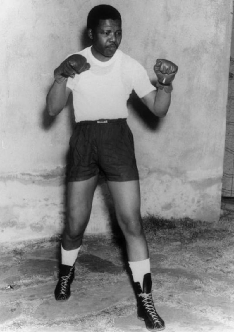 Mandela adopts a boxing pose circa 1950. Getty Images